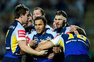 Matthew Bowen celebrates a try against the Broncos. Photo / Getty Images