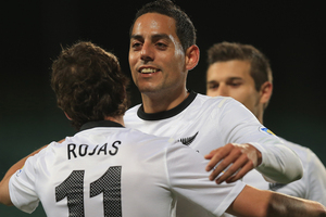 Leo Bertos of New Zealand congratulates Marco Rojas on his goal during the FIFA World Cup Qualifier match between the New Zealand All Whites and Solomon Islands. Photo / Getty Images.