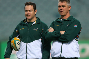 Johann Van Graan and Heyneke Meyer look on during a South Africa Springboks captain's run at Patersons Stadium. Photo / Getty Images.