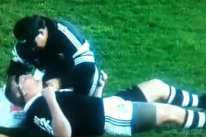 Kiwi Dean Lonergan is treated on the field after being knocked out against Australia. Photo / Supplied