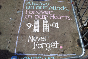 A commemorative message is chalked on to the pavement. Photo / Supplied