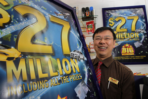 Jensen Zeng pictured in his shop in central Tauranga this morning after learning he sold the winning $27 million Big Wednesday ticket in last nights lotto draw. Photo / Alan Gibson