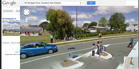 A Google Streetview image of Westgate Drive Auckland showing a child lying in the road during a what is described as a road safety drill. Photo / Supplied