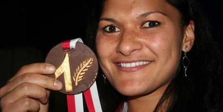Valerie Adams' coach had her chocolate medal customised with a silver fern. Photo / Supplied