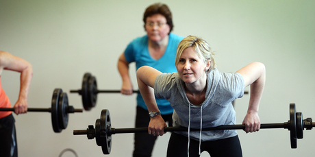 Reporter Rachel Grunwell pushes weights - and enjoys it - at City Fitness, Newmarket, Auckland. Photo / Doug Sherring