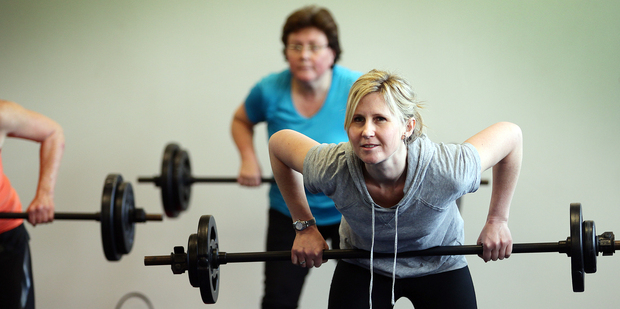 Reporter Rachel Grunwell pushes weights - and enjoys it - at City Fitness, Newmarket, Auckland. Photo / Doug Sherring