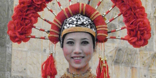 A woman in ethnic costume in Kunming, China. Photo / Graham Reid