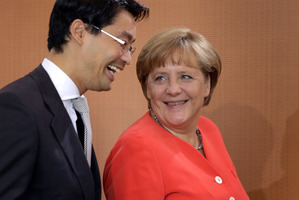 German Chancellor Angela Merkel (right) and German Economy Minister Philipp Roesler. Photo / AP