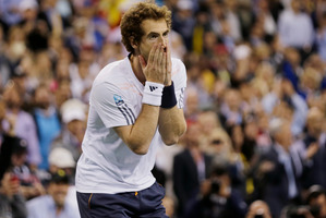 Andy Murray reacts after beating Novak Djokovic yesterday. Photo / AP