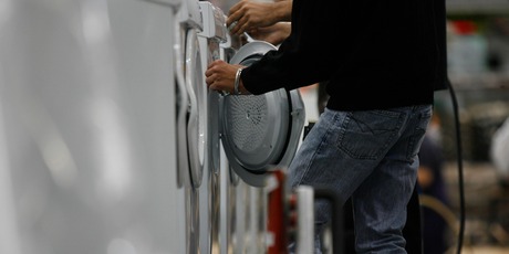Workers make driers at one of Fisher and Paykel's factories. File photo / Glenn Jeffrey