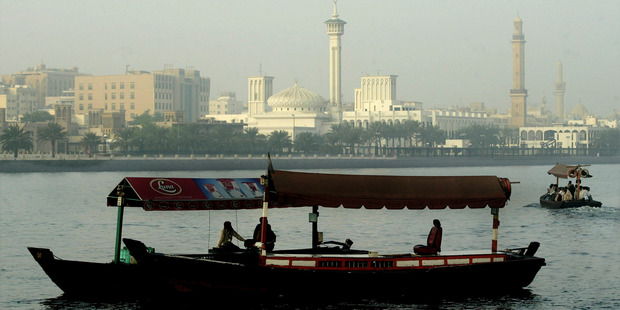 A water taxi floats down the Creek in Dubai. Photo / Alan Gibson