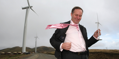 Blowing in the wind ... John Key grapples with the problems of ownership. Photo / Mark Mitchell