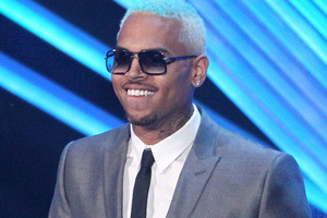 Chris Brown has a new tattoo on his neck. Photo / AP