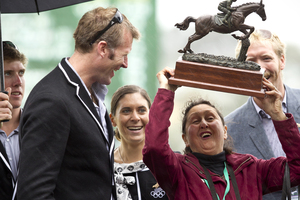 Ann Browne was thrilled after rowing gold medallist Mahe Drysdale presented her with the Great Northern Steeplechase trophy on Saturday. Picture / Dean Purcell
