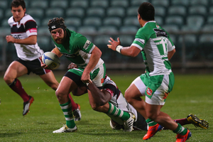Callum Gibbins of Manawatu is tackeld by Filo Paulo of North Harbour. Photo / Getty Images