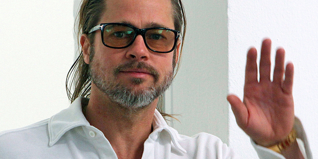 Brad Pitt says top actors have had to wave goodbye to multi-million dollar salaries. Photo / AP
