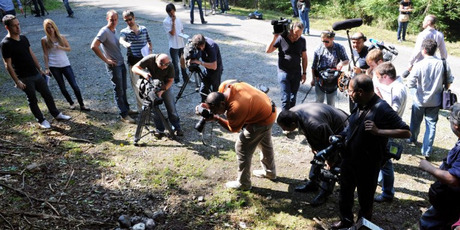 Photographers and cameramen at the scene of last week's shooting near the French village of Chevaline. Photo / AFP