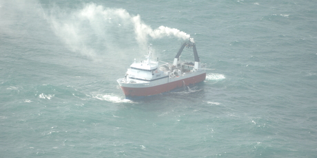 The crew were picked up by nearby vessels after the fire broke out. Photo / RNZAF
