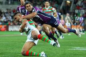 Nathan Merritt of the Rabbitohs is tackled during the match between the Melbourne Storm and the South Sydney Rabbitohs. Photo / Getty Images