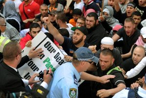 Angry protesters clash with police in Sydney. Photo / AFP