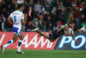 Adam Reynolds scores for the Rabbitohs. Photo / Getty Images