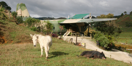 A Bristol Freighter is one of the more unusual places to lay your head on a visit to Waitomo. Photo / Pamela Wade