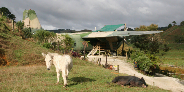 A Bristol Freighter is one of the more unusual places to lay your head on a visit to Waitomo. Photo / Pamela Wade