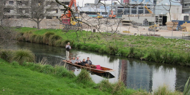 Cruising down the Avon river with the CBD rebuild underway in the background. Photo / Chris Barton