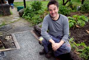 Justin Newcombe with his finished concrete slab. Photo / Natalie Slade