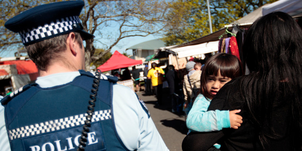 A Neighbourhood Policing Team walks the beat around Otahuhu. Photo / Michael Craig