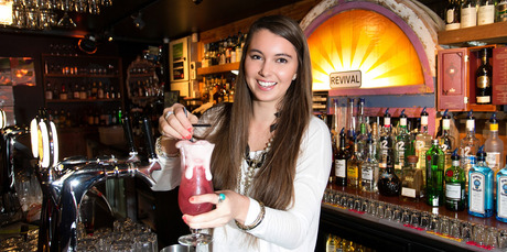 Clare Laredo mixes drinks at Revival Bar. Photo / Martin Hunter