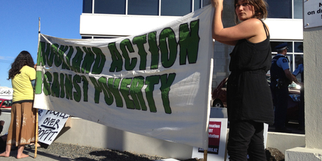 Protestors outside the Ministry of Social Development's Auckland building in Ellerslie . Photo / Dean Purcell