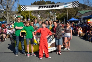 The cast of Kiwi Flyer gear up for a race down Collingwood St in the Nelson Trolley Derby. Photo / Supplied