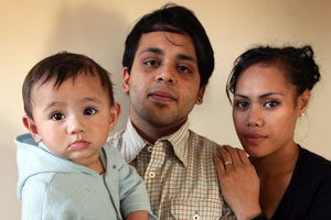 Gaurav Sharma and Tepou Heremaia with their son. Photo / Doug Sherring