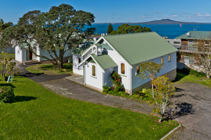 The Castor Bay church is thought to be more than 100 years old. It and the church hall, built in 1933, sit on a 1133sq m block of prime real estate. Photo / Supplied