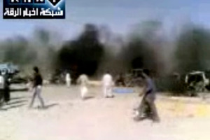 Image taken from video obtained from the Ugarit News, (authenticated based on its contents and other AP reporting), of the site of the petrol station explosion. Photo / AP