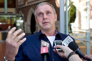 An emotional Evans Mott talks to media outside the High Court at Auckland after being discharged without conviction. Photo / NZ Herald