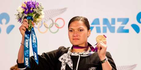 ANZ's logo is prominent as Valerie Adams receives her medal. Photo / Greg Bowker