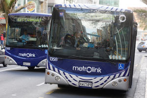 Electronic displays at bus stops "lie" about waiting times, and Auckland Council's Hop Card is "probably not worth your while", wrote the Lonely Planet. Photo / NZ Herald