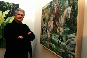 Taranaki artist John McLean in 2007 with one of his works. File photo / Andrew Labett
