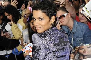 The publication of topless photos of Kate Middleton could be used against Halle Berry in her bid to move to France. Photo / AP