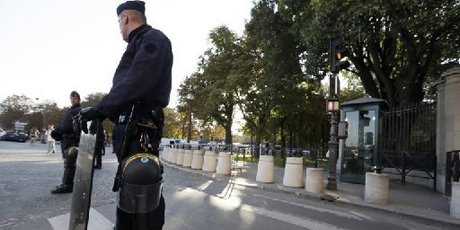 French Gendarmes stand in front of the US embassy on the Champs-Elysees avenue in Paris. Photo / AFP