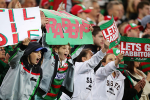 Young Rabbitohs fans cheer on their side. Photo / Getty Images