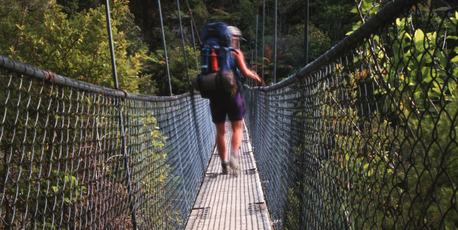 The suspension bridge over the Falls River is a highlight of the Abel Tasman Track. Photo / Rika Milne