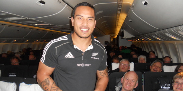 Hosea Gear takes a turn as a flight steward on board Air New Zealand flight 1349 bound for Buenos Aires. Photo / James Ihaka