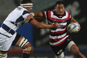 Bundee Aki of Counties Manukau (R) fends off the defence during the round 11 ITM Cup match between Auckland and Counties Manukau at Eden Park. Photo / Getty Images.