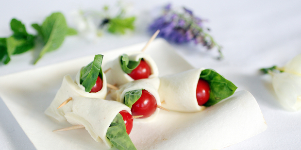Try tomatoes wrapped in Pugliese mozzarella style cheese. Photo / Doug Sherring