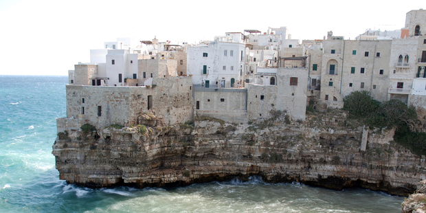 Polignano a Mare is in a dramatic location above a pounding surf. Photo / Getty Images