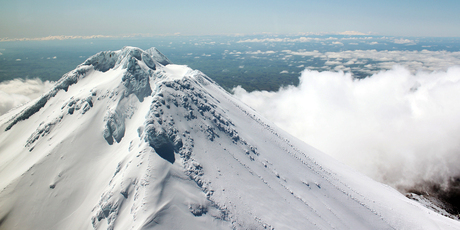 On a clear, calm day you can chopper over Mt Taranaki and see the 120,000-year-old. Photo / Venture Taranaki