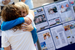Tracey Marceau comforts Trish Ferguson, Gary Marshall's ex-wife, at White Heart Day. Photo / Richard Robinson